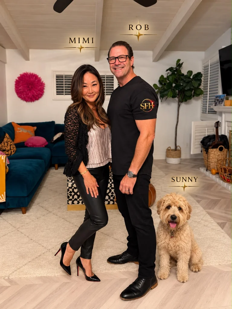Coach Rob in an SFH shirt at home with Mimi and their dog Sunny
